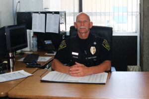 Officer Whittaker in his office./Araceli Galarza • Lowry Multimedia Communications