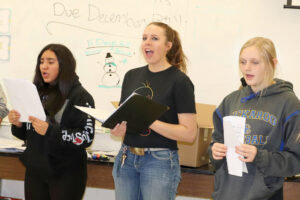 Frankie Baumeister and one of her performance groups practice for their next concert./ Clarissa Olson • Lowry Digital Media