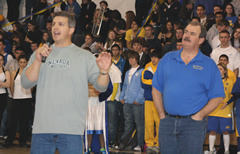 Chad Peters presents Vince Mendiola with an award at an assembly earlier in the school year./Staff • The Brand