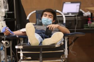 Robert Rangel relaxing while he donates blood on February 18, 2021. /Chris Gildone • The Brand