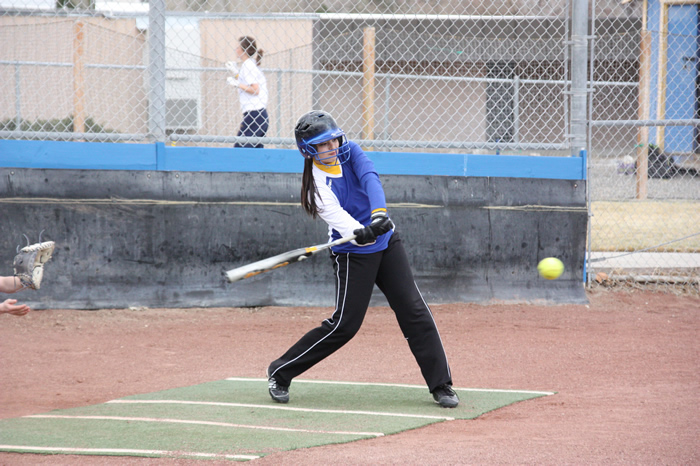 Heather McElvain practices hitting. /Courtesy • Winnada