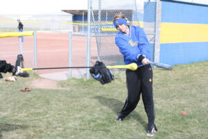 Kayla Doyle works on her hitting during softball practice. /Brandon Eastman • The Brand