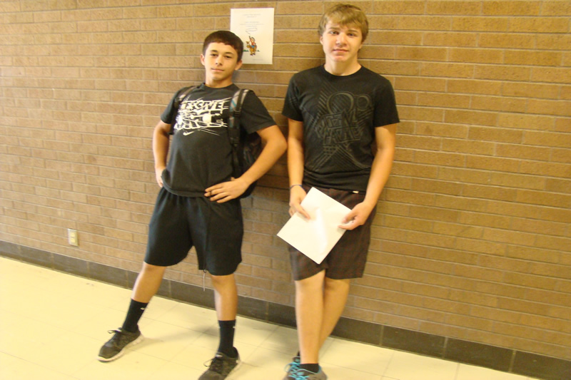 Troy Hardy and Christian Dawson pose for black out day. /Jessie Schirrick • The Brand