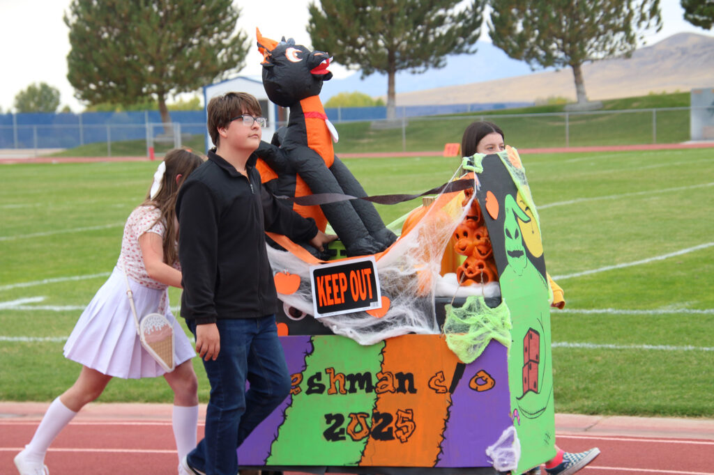 Lowry’s freshman class shows off their Mini Float during the mini Parade. /Alora McClure • The Brand