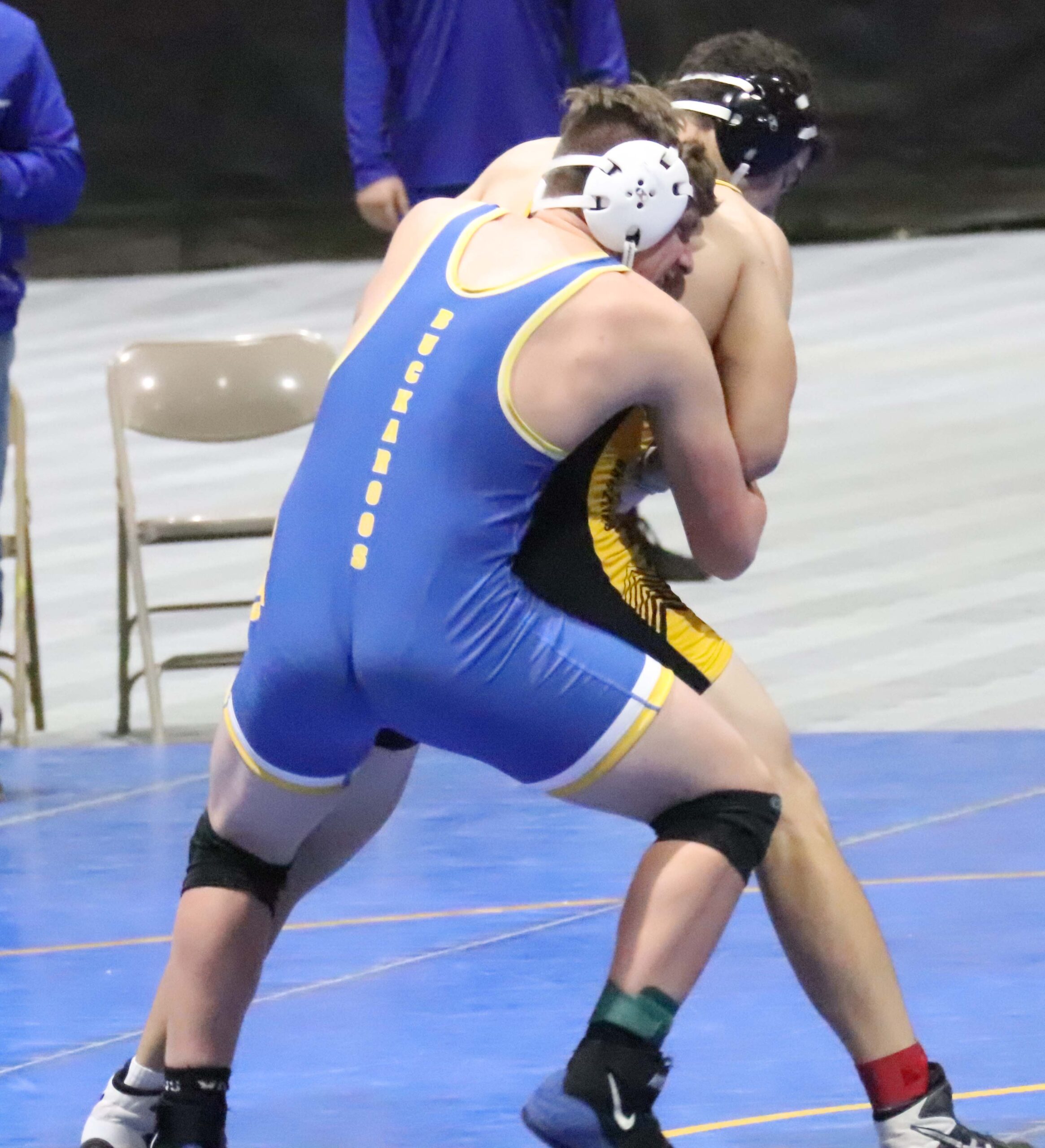 Luke Fentress tries to take down his opponent./Maddi McClure •The Brand 
