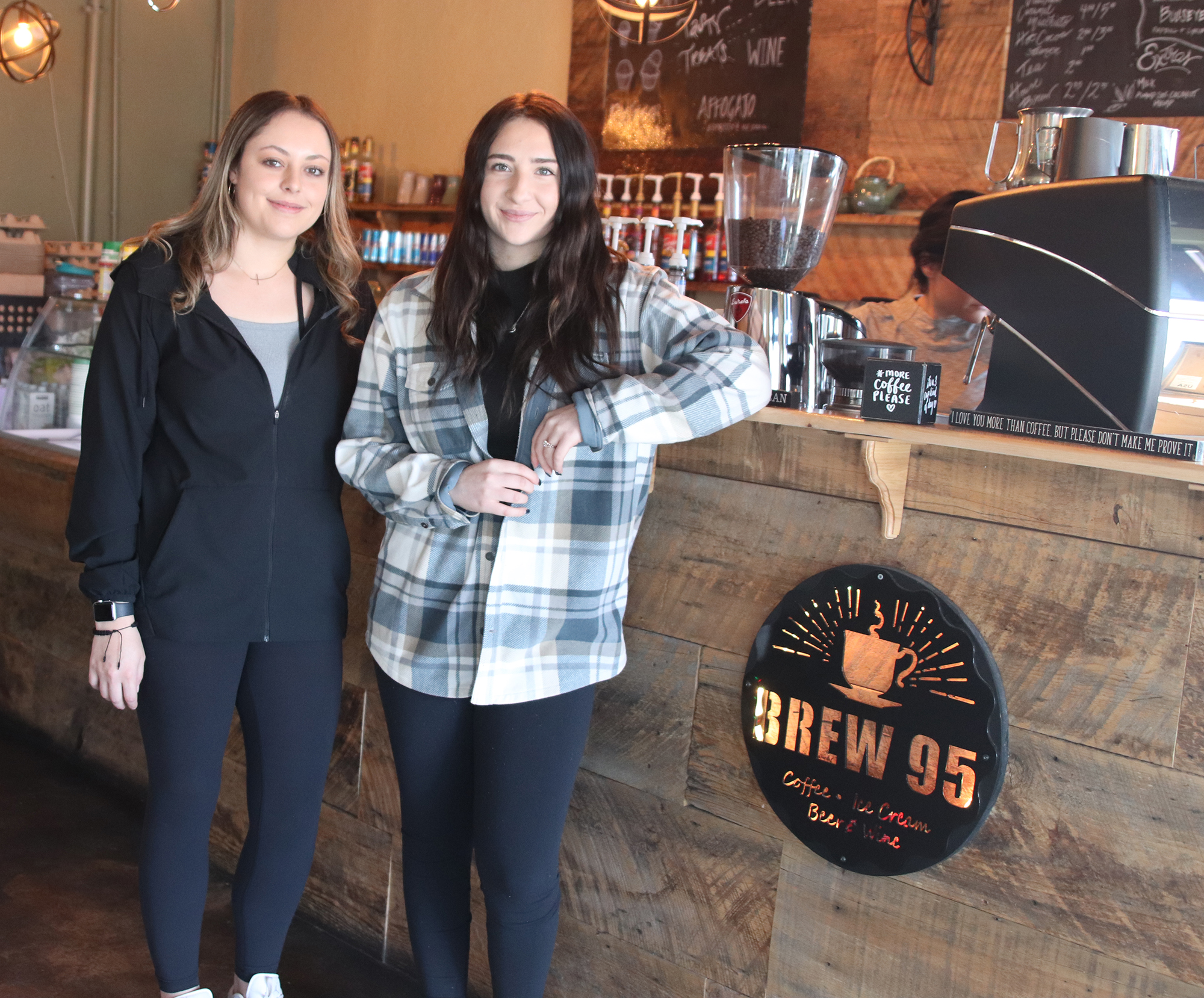 Kaytee Delany and Katie Cabada worked together throughout their senior year as baristas at Brew 95./ Kailey Franklin • The Brand