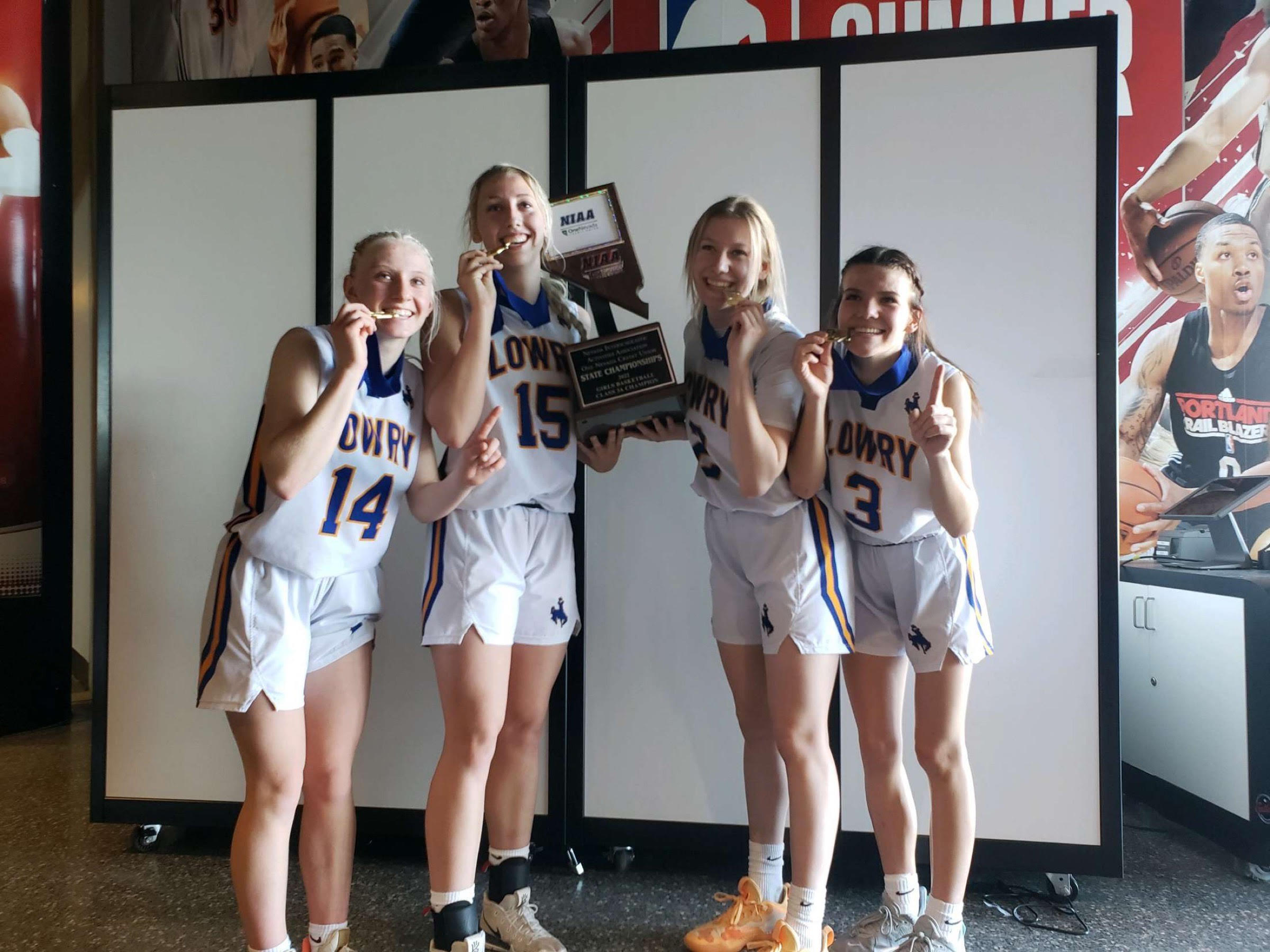 Senior team captains pose with the trophy after winning state in Las Vegas. /Courtesy • Lisa Scott