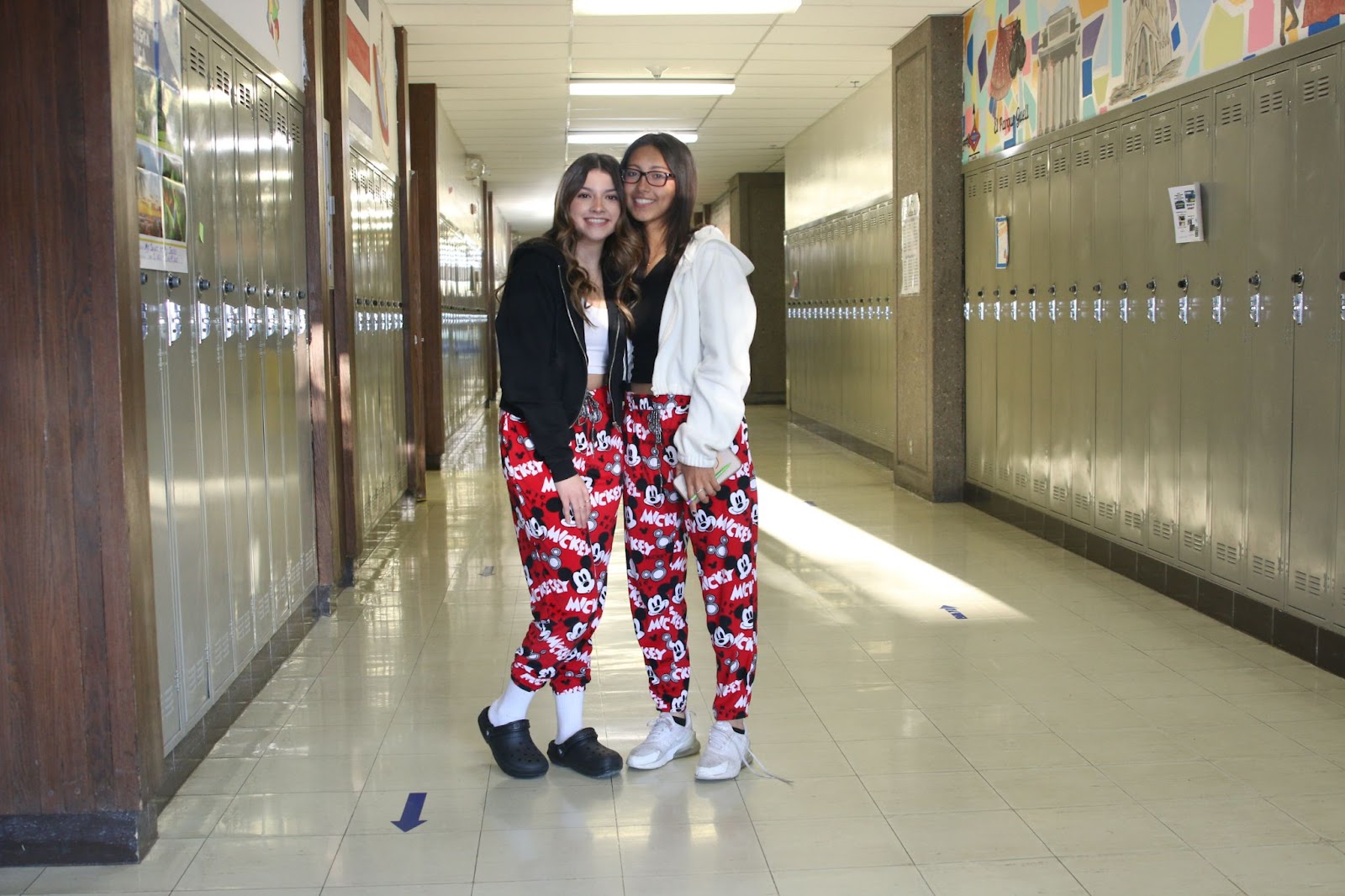 Ariana Diaz and Litzi Silva Ramirez wear matching pajama pants for Dress for Success or Pajama Day. /Tony Harness • The Brand