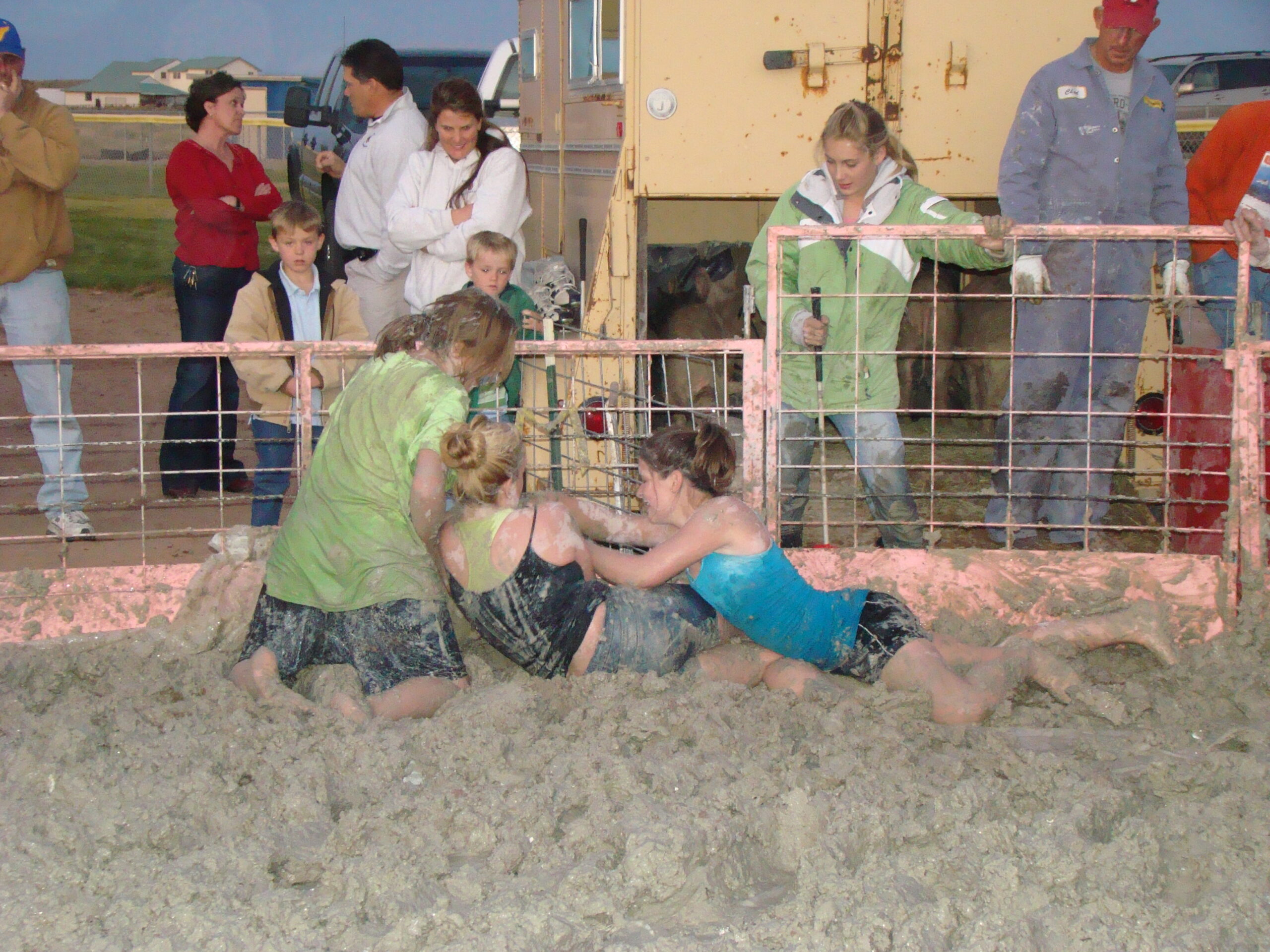 Student participating in pig wrestling during the 2008 Homecoming. /Ron Espinola • The Brand