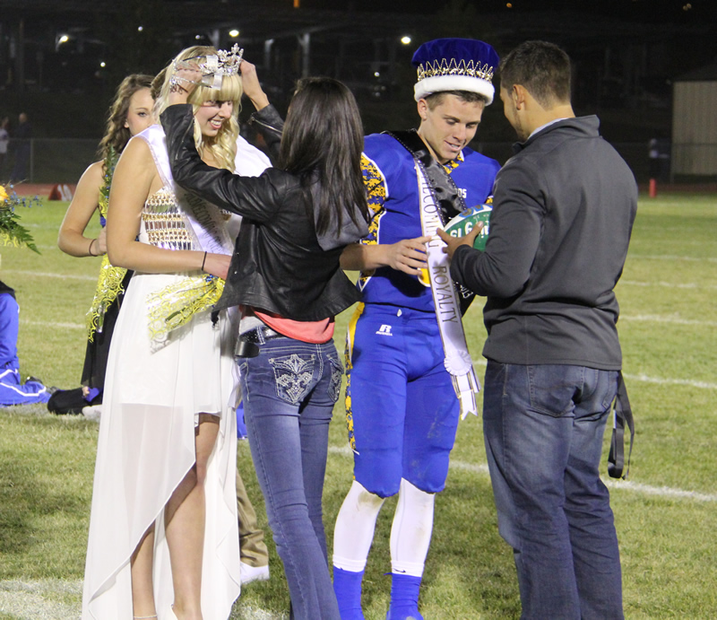 In 2013 Allison Barron is crowned queen by former queen Whitney Waller. /Justin Albright • The Brand