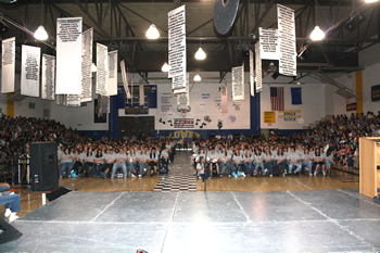 Students fill the New Gym for the Assembly of Excellence. /Ron Espinola • The Brand