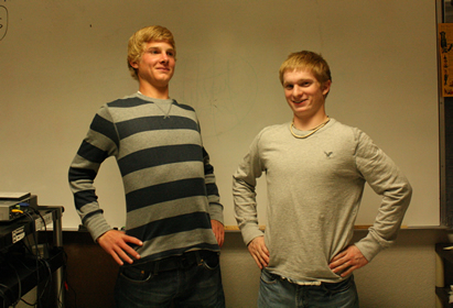 Junior starters Anders Pace and Sterling Snow strike a “He-Man” pose. /Mary Granath • The Brand