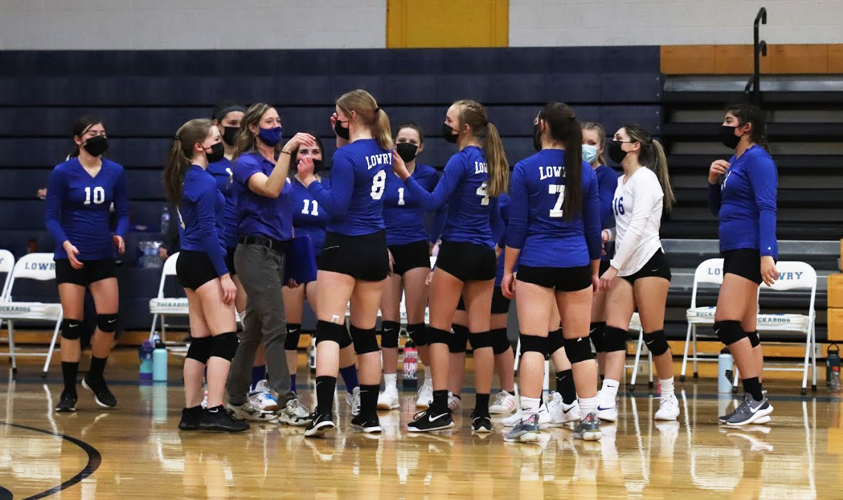 Frosh volleyball; Learning the Lowry way Lowry High