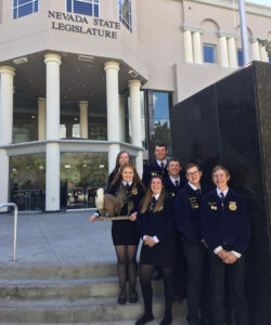 Members of the FFA Ag Issues team posing at the state capital./ Courtesy • Rebecca Hill