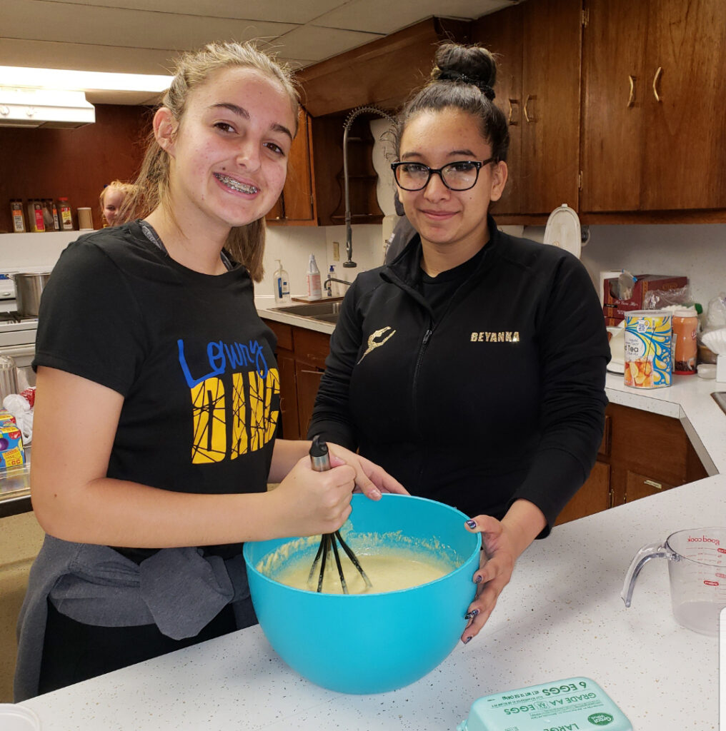 Lowry dance team members working at the Winnemucca Soup Kitchen/Courtesy • Lowry Dance