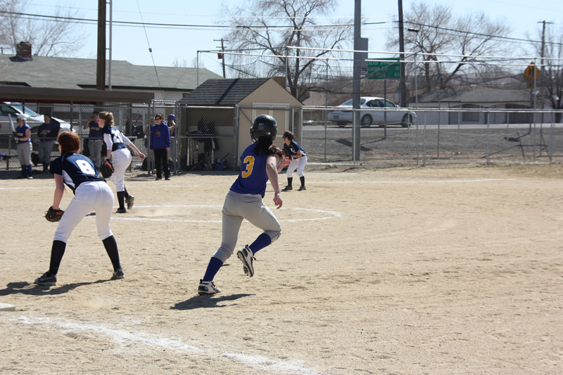 Lexie Coleman takes her lead from first base. /Courtesy • Winnada