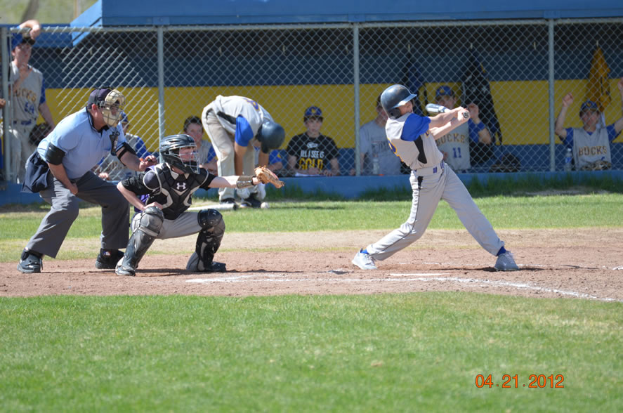 Daniel Pollock swings at a pitch against Spring Creek. /Courtesy • Lorin Noble