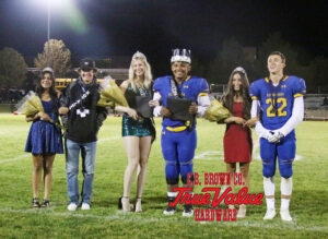 Homecoming court poses for a picture after Hannah Whitted and Boni Jacinto are crowned King and Queen. /Nadia Novi • The Brand