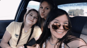 Madison Rackley, Lexi Chaffin, and Kenzi Dowd Smith pose together for a selfie in the car on one of their many adventures. /Courtesy • Kenzi Dowd
