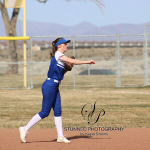 Jada Matheny makes a throw to first base./ Ariana Perez • The Brand