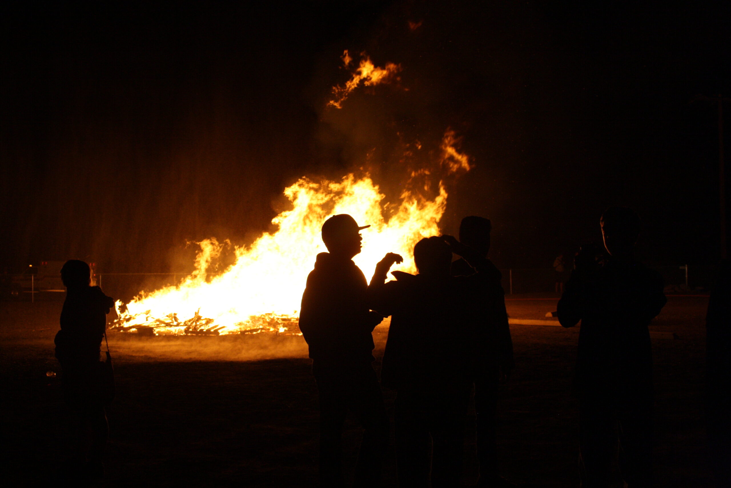 Students at the 2014 Homecoming bonfire. /Ron Espinola • The Brand