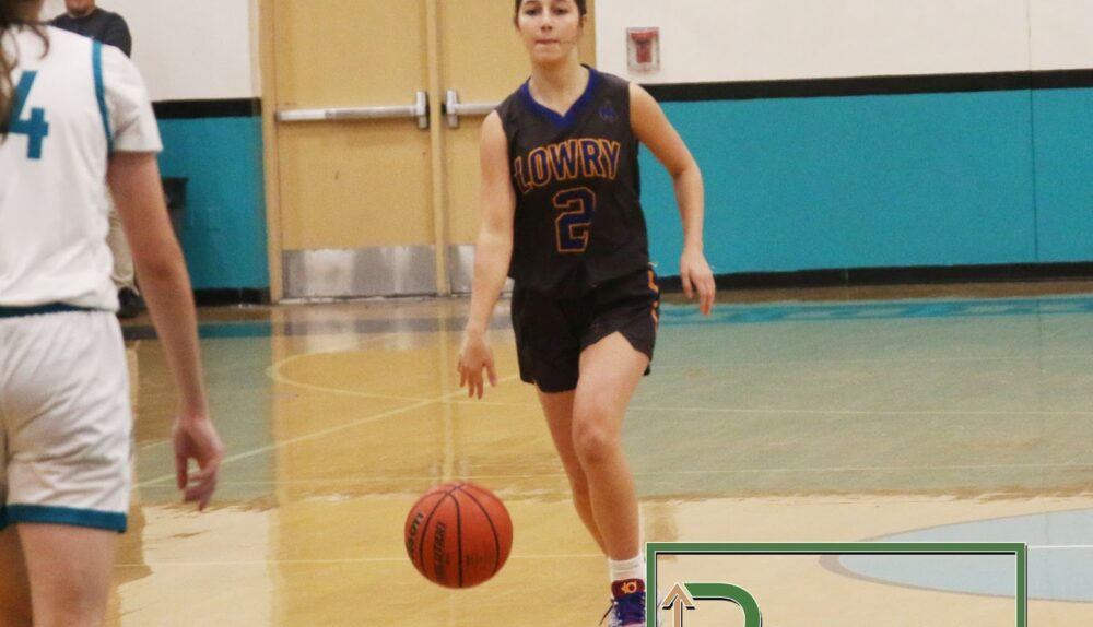 Autum Sanchez dribbles the ball up the court while playing against North Valleys. /Danielle Scott • The Brand