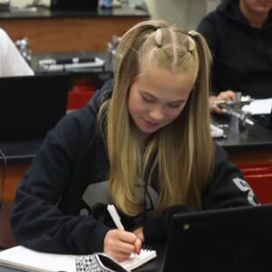 Ashlyn Bottoms working on an assignment in Anderson’s class after being chosen for student of the week. /Jocilyn Hawkins • The Brand