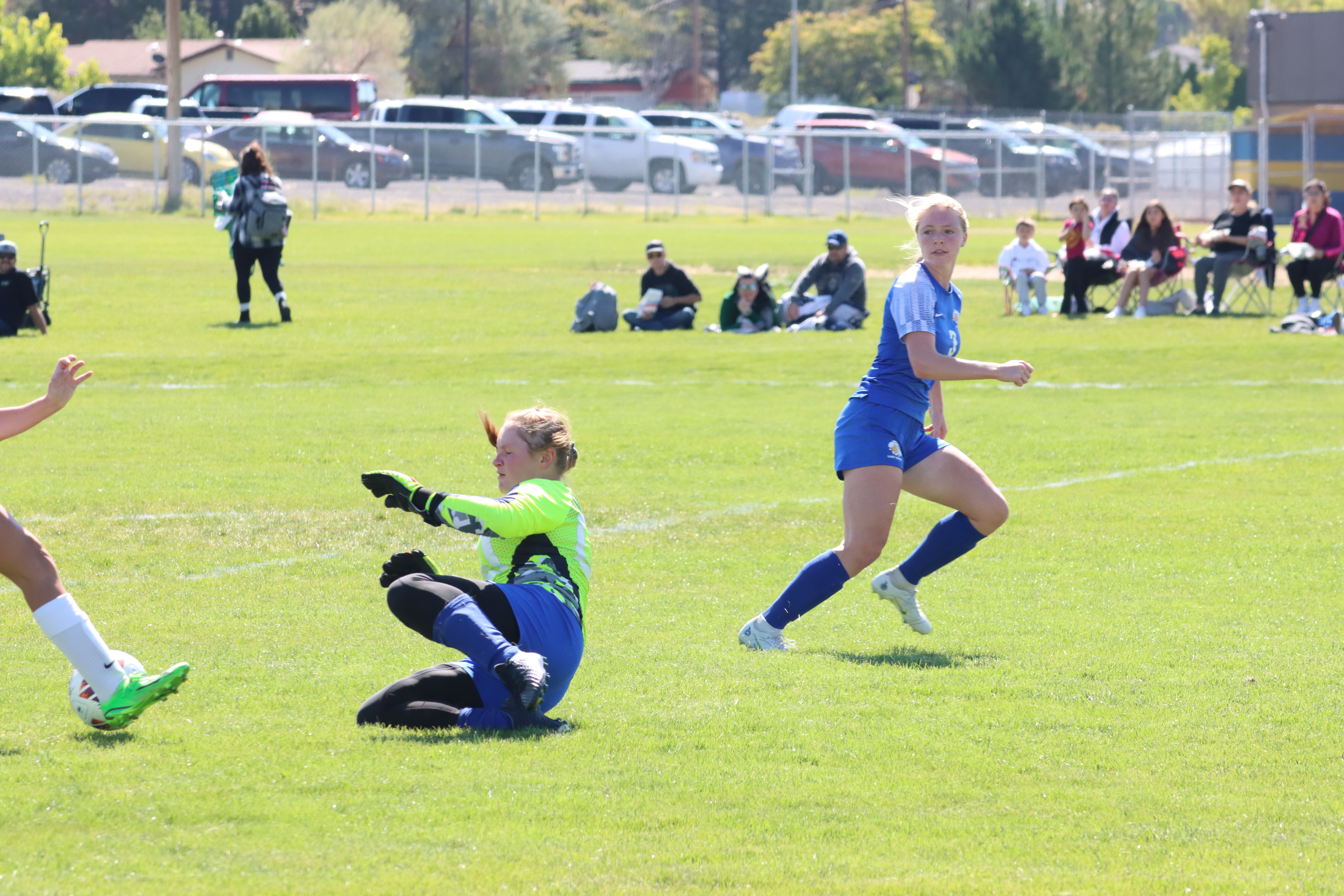 Bryce Brinkerhoff retreats back to cover her goalie to protect the goal./ Ron Espinola • The Brand