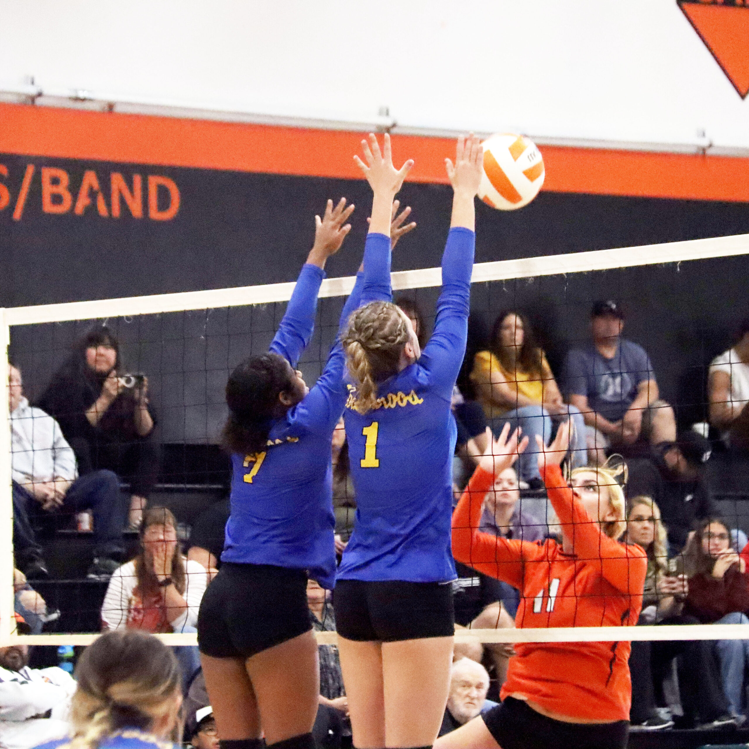 Tariana Weatherspoon and Kyra Schiermeister block at the net./ Raegan Terry • The Brand