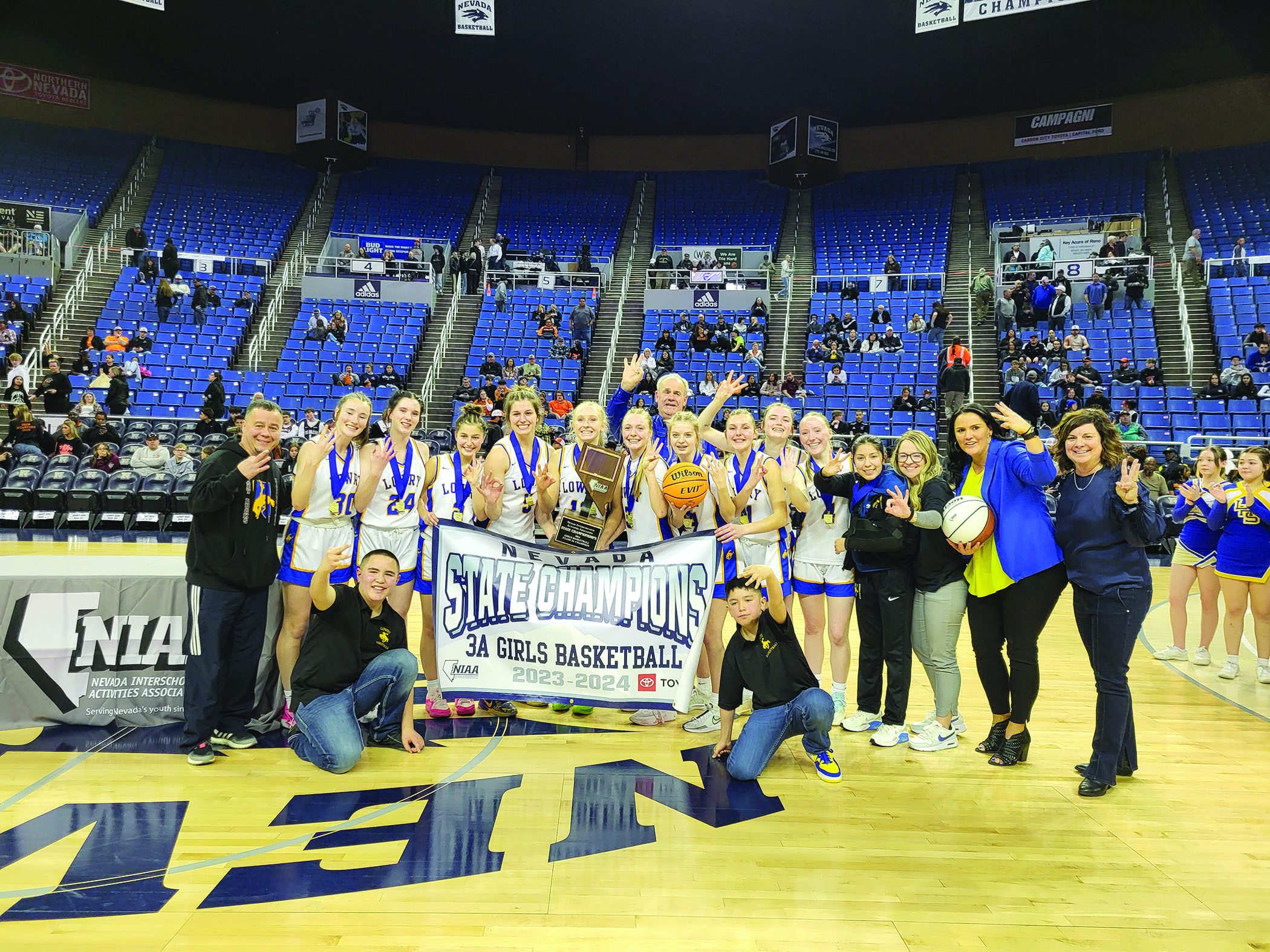 The team celebrates its third state title. /Courtesy • Tony Erquiaga