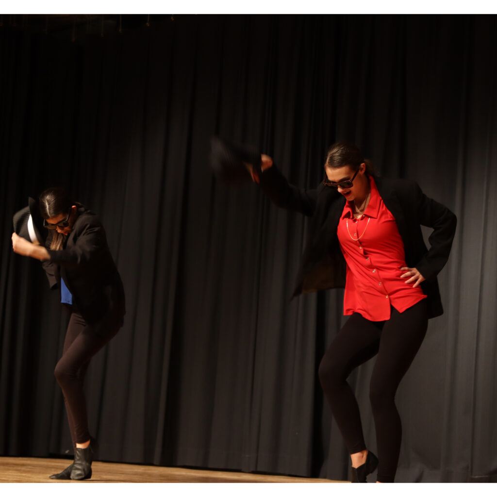 Maygan Robinson and Emily Anderson dancing in the talent show./ Alexa Toscano• The Brand