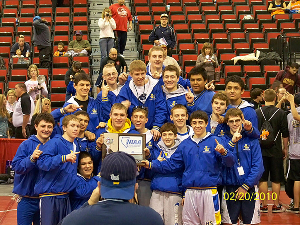 Wrestlers and the state championship trophy. /Courtesy • Christy Bell