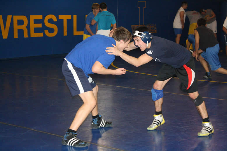 Mitch Pollock (right) at Wrestling practice in January of 2011./Marc Esquivel • The Brand