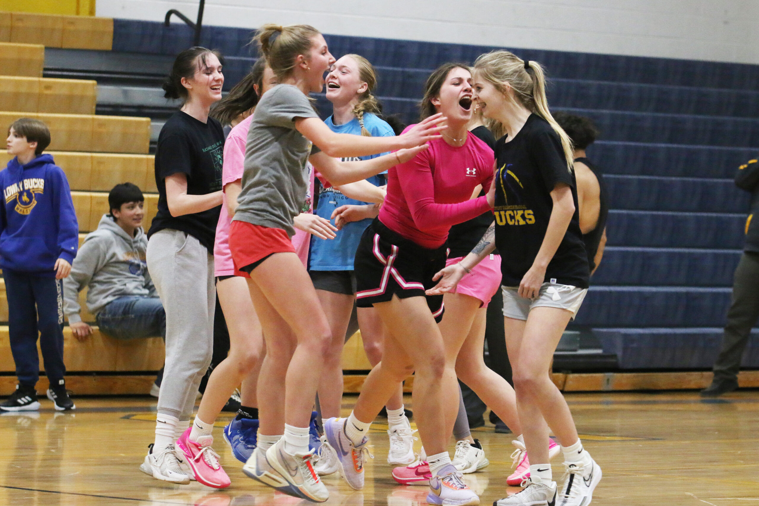Members of the girl’s basketball team celebrate at the Dodgeball Tournament. /Macy Whitted • The Brand