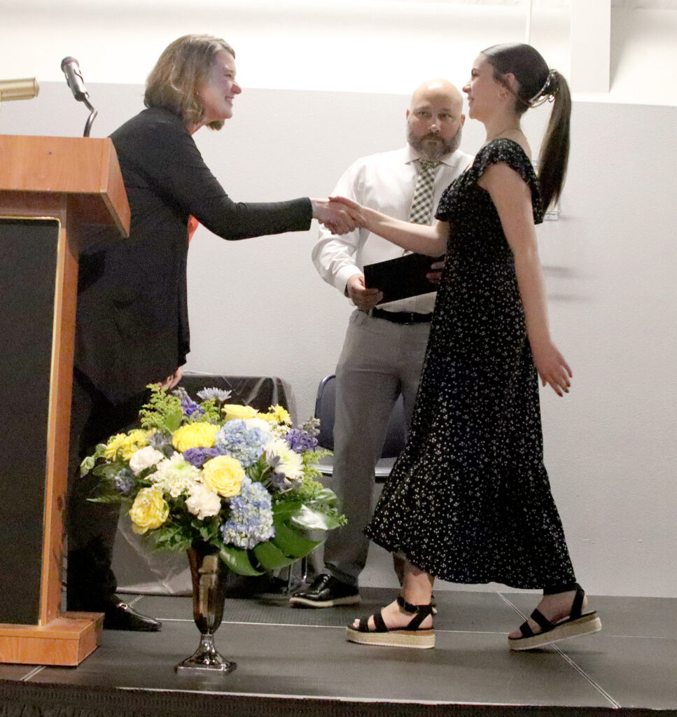Piper Nichols receives a scholarship./Ron Espinola • The Brand
