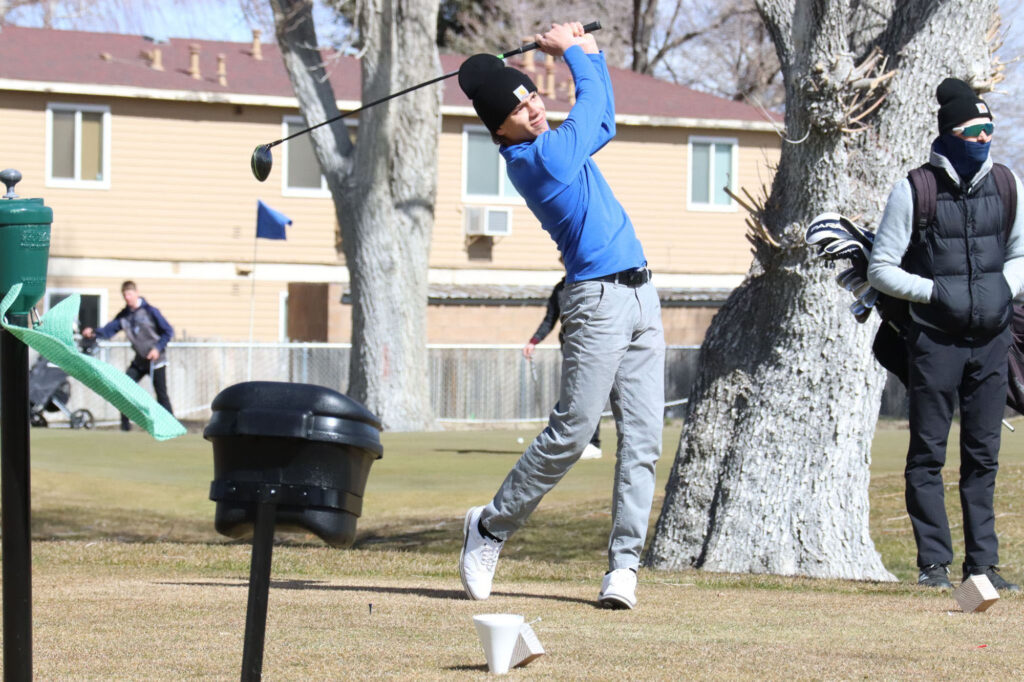 Landon Esquivel makes a shot during the Icebreaker on hole six. /Alexis Galarza • The Brand