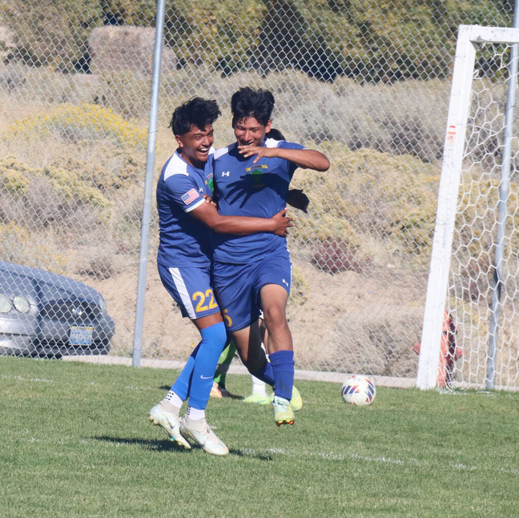 Victor Cruz and Nazareth Razo celebrate scoring a goal.   /Alexis Galarza • The Brand