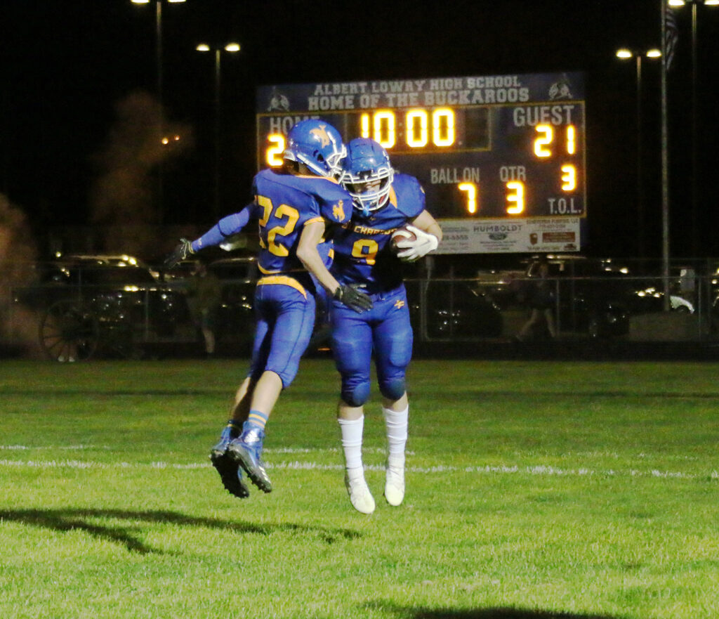 Marcas Ricci and Luke Fentress celebrate after Fentress scored a touchdown. /Alexis Galarza • The Brand