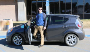 Jed Teichert gets out of his Prius/ Brody Goucher• The Brand