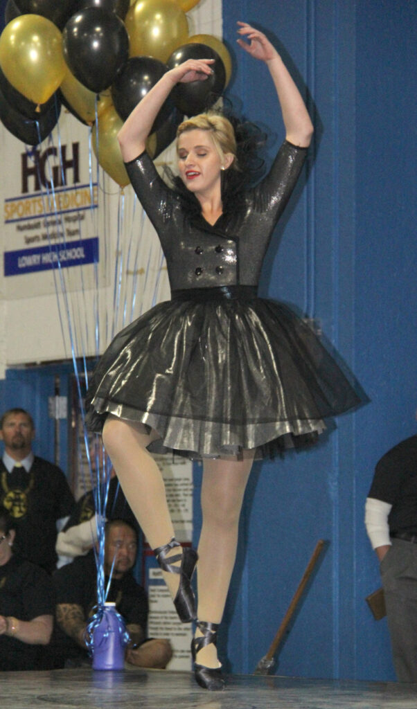 Chelsea Baker performs during the Academic Assembly./Ron Espinola •The Brand 