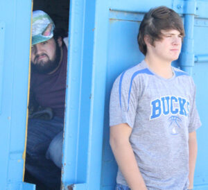 Senior picture of Trey Marriott that shows the supposed sasquatch./Gavin Swanson • The Brand