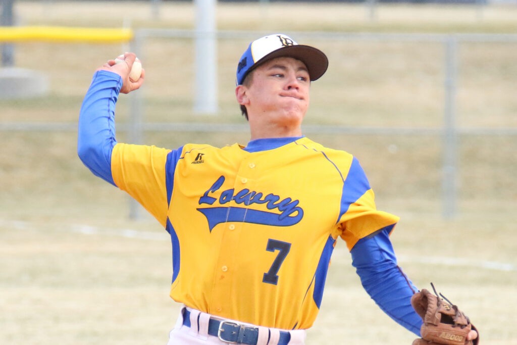 Ridge Ricketts delivers a pitch against Spring Creek last year./Ron Espinola • The Brand