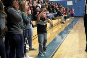 Txendoa Cabatbat getting the student section excited./Ron Espinola • The Brand
