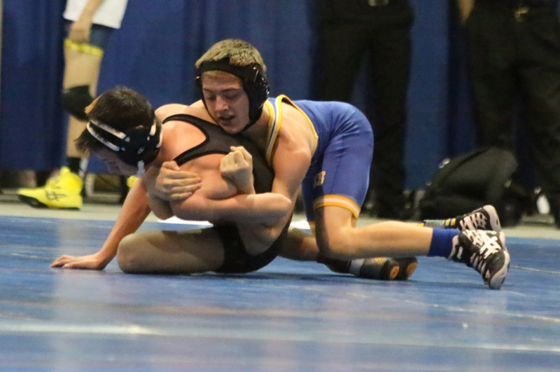 Bryan Day controls an opponent./Weston Irons • The Brand