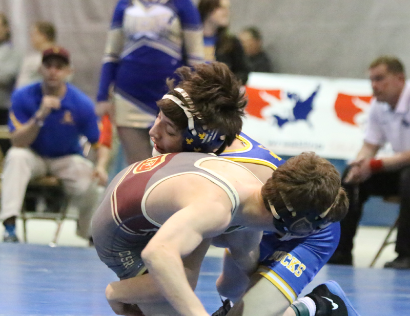 Nathen Blanco turns a Faith Lutheran opponent over./Weston Irons • The Brand
