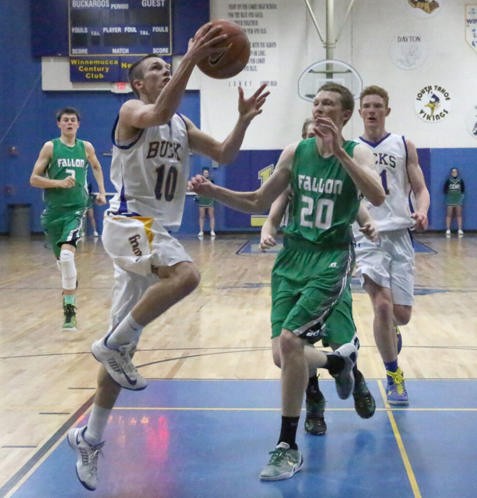 Sterling Dennis goes in for a layup./Dani Ricker • The Brand