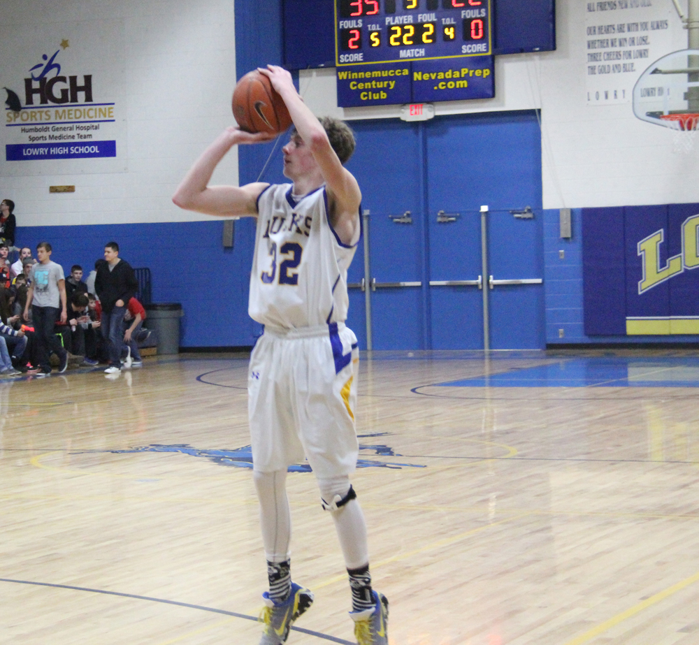 Christian Gray puts up  a shot./Dani Ricker • The Brand