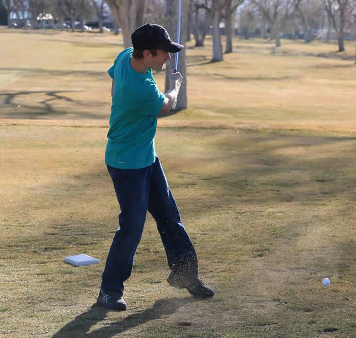 Bryan Day tees off./ Weston Irons • The Brand