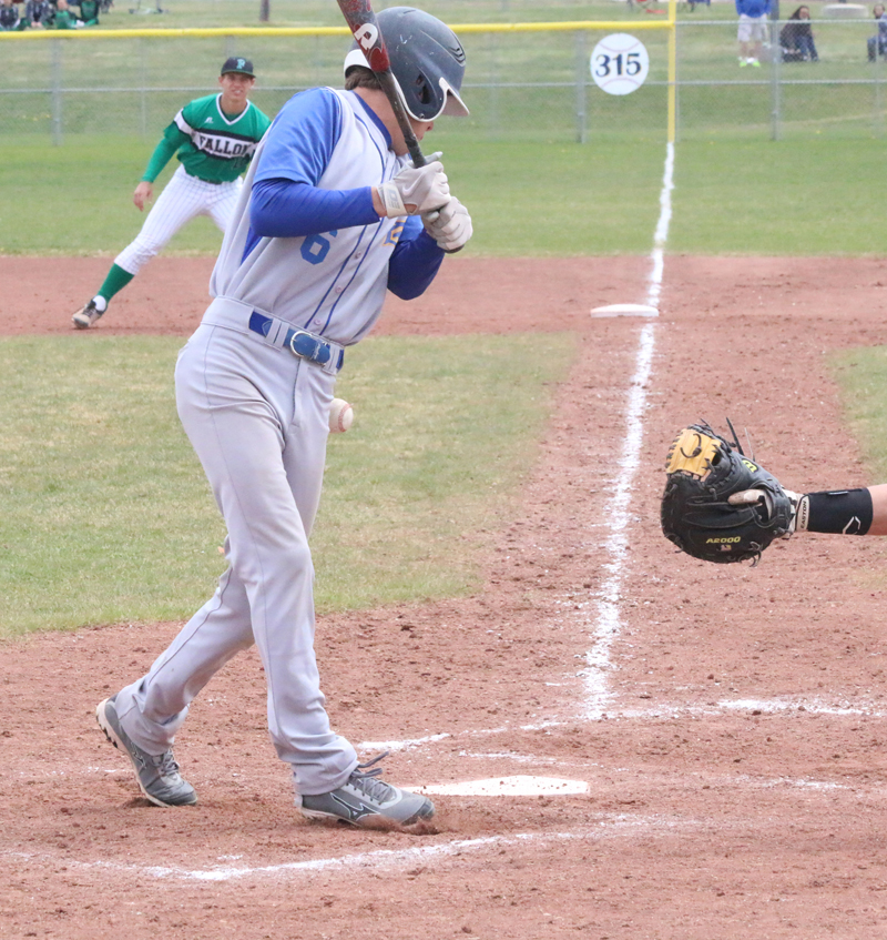 Cameron Okuma gets hit by a pitch./Levi Lloyd • Lowry Baseball