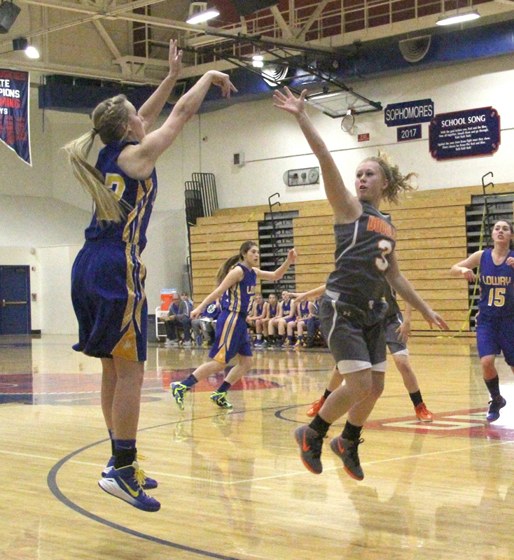 Jillian Albright shoots over the defender./Aimee Brandon • The Brand
